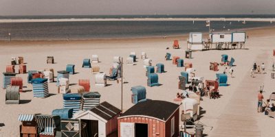 Colorful beach cabins on the sandy shores of Borkum, Germany.